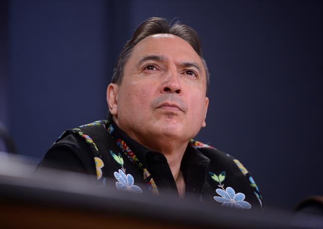 Assembly of First Nations (AFN) National Chief Perry Bellegarde is joined by First Nations leaders at a press conference at the National Press Theatre in Ottawa on Tuesday, Feb. 18, 2020. National Chief Perry Bellegarde of the Assembly of First Nations says he won't seek re-election in the organization's general assembly in July. THE CANADIAN PRESS/Sean Kilpatrick