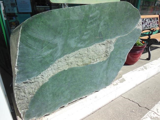 Cariboo Jade and Gifts with a jade boulder near the front door is shown in this handout image in Cache Creek, B.C. The owner of a gift store in British Columbia's southern Interior says no one will benefit if a huge jade boulder stolen from the front of her shop is carved up by thieves. The nearly 1,300 kilogram slab of jade was stolen from the front of the store in Cache Creek, west of Kamloops, on Saturday and owner Heidi Roy suspects the crooks don't know they went to a lot of effort to take something that has nothing but sentimental value. THE CANADIAN PRESS/HO-Heidi Roy*MANDATORY CREDIT*