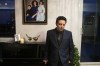 Alireza Ghandchi is photographed in front of a portrait of his wife Faezeh, daughter Dorsa and son Daniel in Richmond Hill, Ont., Friday, January 1, 2021. Ghandchi lost his family after Iranian forces shot down a Ukrainian passenger jet on Jan. 8, 2020. THE CANADIAN PRESS/Chris Young