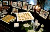 Food and candles surround photos of Ottawa area victims of Ukraine International Airlines Flight PS752, at Ottawa City Hall, on Sunday, Jan. 19, 2020. THE CANADIAN PRESS/Justin Tang