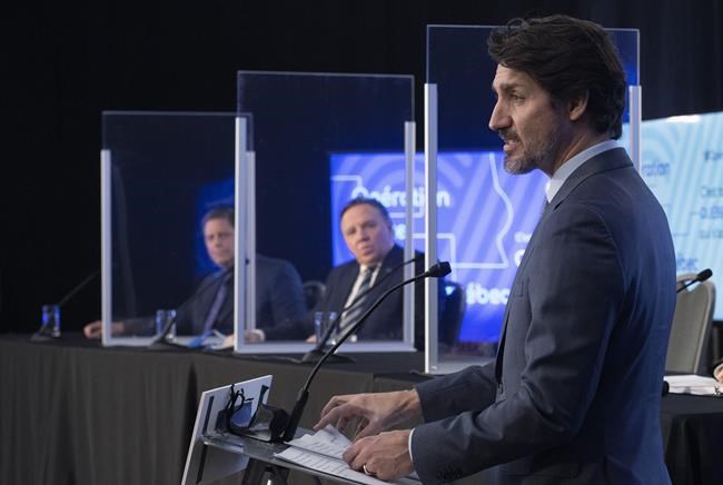 Prime Minister Justin Trudeau jointly announces high speed internet for Quebec regions, as Quebec Premier Francois Legault, left, looks on, Monday, March 22, 2021 in Trois-Rivieres Que. THE CANADIAN PRESS/Jacques Boissinot