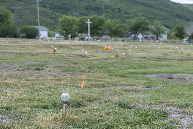The site of a former residential school where, last month, ground-penetrating radar detected a potential 751 unmarked graves in Cowessess First Nation, Sask., Tuesday, July 6, 2021. A group of Saskatchewan First Nations is beginning their search for unmarked graves at the grounds of the former Delmas/Thunderchild Indian Residential School.THE CANADIAN PRESS/Liam Richards