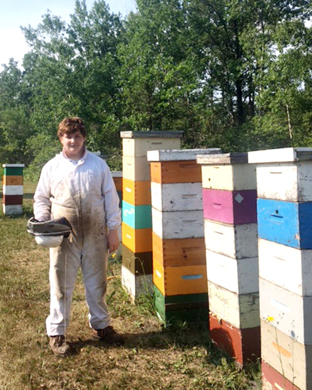SUBMITTED PHOTO
Noah Bergmann, a cousin’s grandson, is the latest teenager to have a summer job at the Bergmann bee yards.