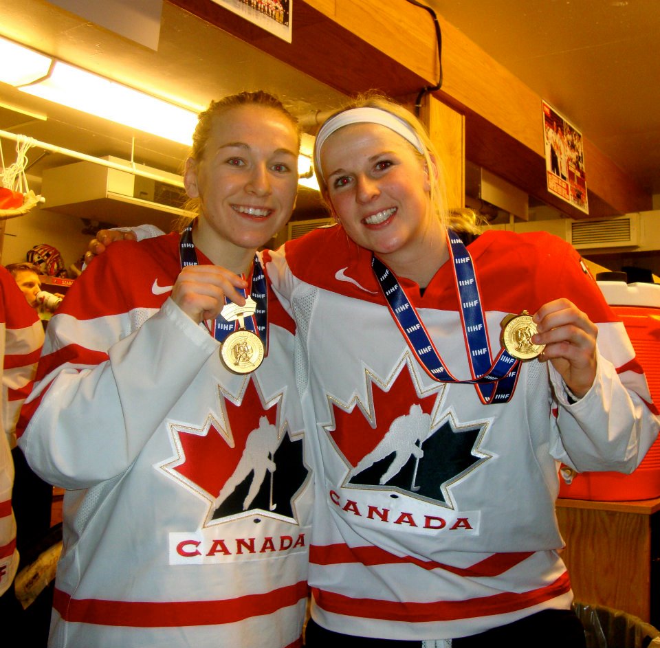 Ste Anne natives Jocelyne Larocque (left) and Bailey Bram, pictured here with their gold medals from the 2012 World Women's Hockey Championships, have been named to Canada's Olympic centralized roster.