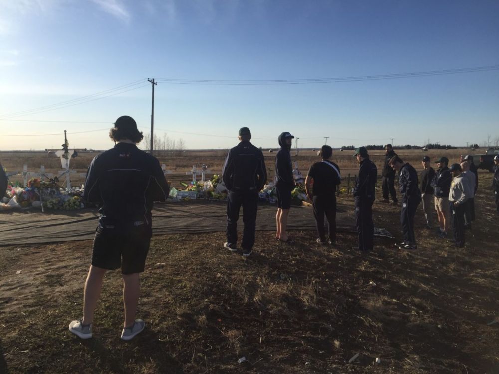 Submitted photo
The Pistons pay their respects to the Broncos at the crash site while they were enroute to Nipawin, just three weeks after the crash.