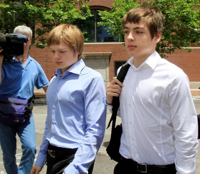 In this July 1, 2010 file photo, Alexander Vavilov, right, and his older brother brother Timothy leave a federal court after a bail hearing for their parents Donald Heathfield and Tracey Ann Foley, in Boston, Massachusetts. The Supreme Court of Canada has decided the Toronto-born sons of Russian spies are actually Canadian citizens. The high court decision today upholds a Federal Court of Appeal ruling that effectively affirmed the citizenship of Alexander and Timothy Vavilov.THE CANADIAN PRESS/AP/Elise Amendola