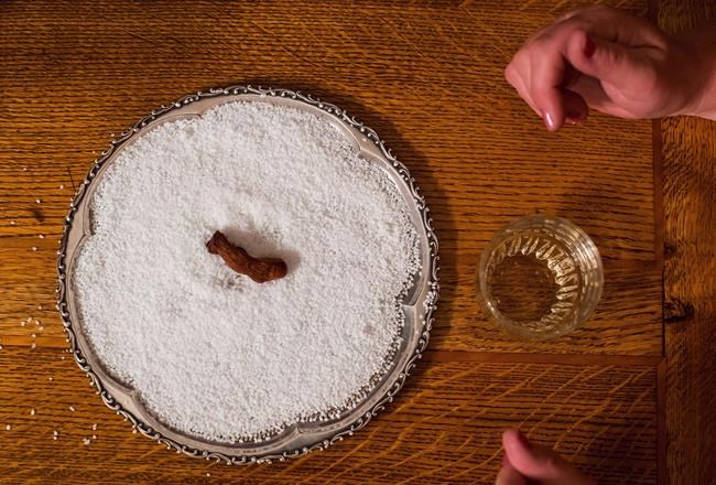 A dehydrated human toe that is used in the Sourtoe Cocktail rests on a bed of salt at the Downtown Hotel, before being dropped in a shot of whisky for a customer, in Dawson City, Yukon, in Dawson City, Yukon, on Sunday, July 1, 2018. The founder of the legendary Sourtoe Cocktail, a shot of Yukon whisky poured over a pickled human big toe, has poured his last drink. Dick Stevenson, the former Dawson City, Yukon bartender known worldwide as Captain Dick, has died. He was 89. THE CANADIAN PRESS/Darryl Dyck