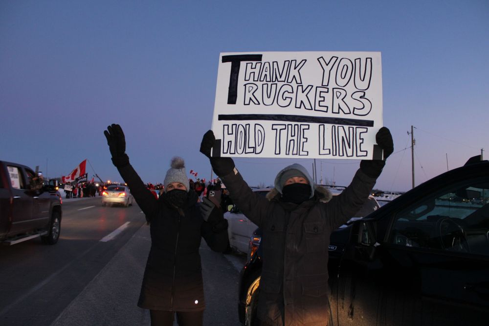 GREG VANDERMEULEN / THE CARILLON
A simple message shared with the passing convoy.
