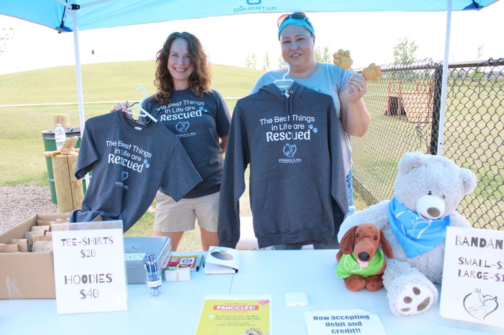 Adoption coordinator Sandra Watson and President Michelle Neufeld represented Steinbach Area Animal Rescue at the opening.
