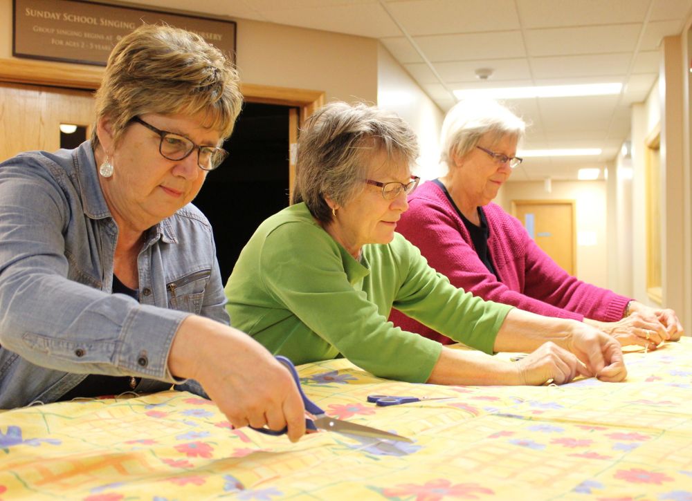 Jordan Ross
Elenore Dyck, Lois Janzen, and Mary Martens work on a comforter destined for a recipient living in a disaster or conflict zone around the globe.