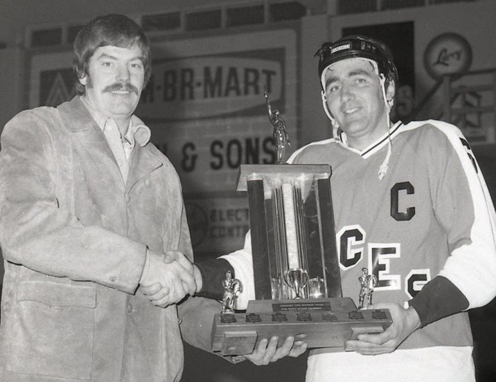 The Carillon archives
Legendary Ste. Anne Aces captain Maurice Chaput, seen here in 1978 accepting the HTHL championship trophy, passed away last week at age 74.