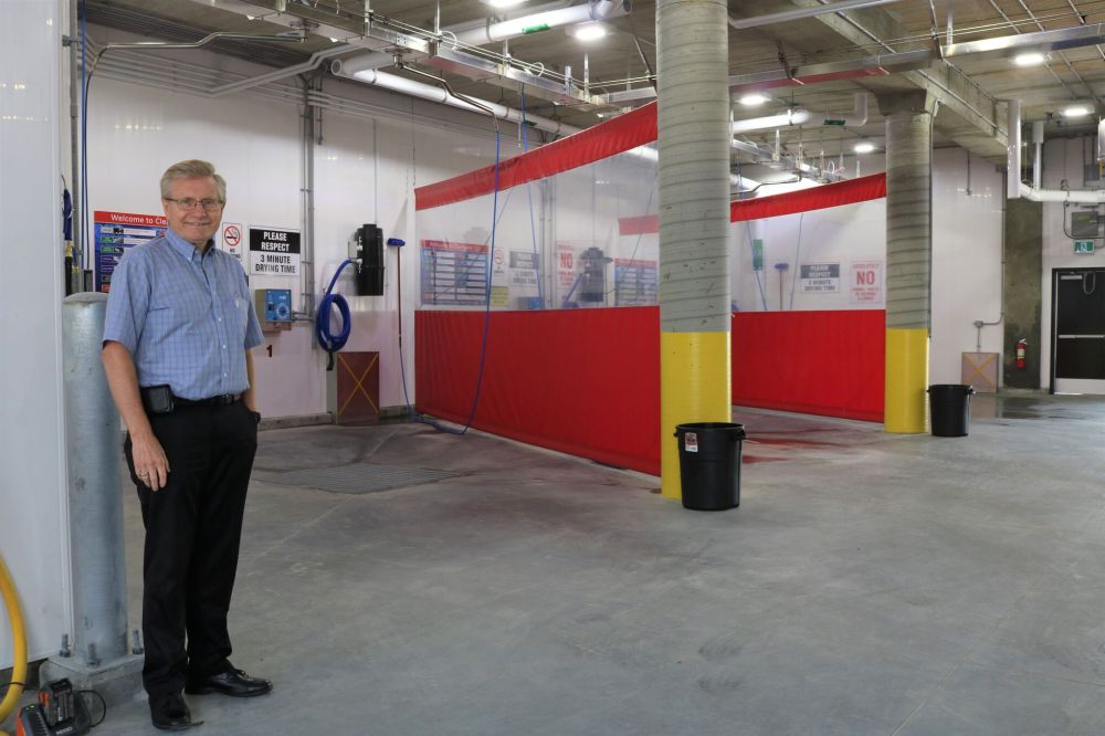 NICOLE BUFFIE | THE CARILLON
Henry Nickel, general manager of Clearview Co-op, in the new Mitchell wand wash, which opened last Thursday along with the new gas bar and convenience store.