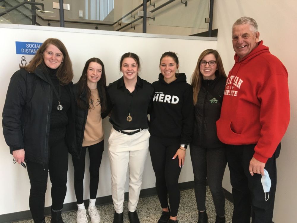 Supplied image
A proud Leon Morrissette poses for a photo at the recent Manitoba Ringette Championships with his daughter Lynn Girardon (from the left) along with his granddaughters Cali Morrisette, Bree Morrissette, Nicole Girardin and Caroline Girardin.
