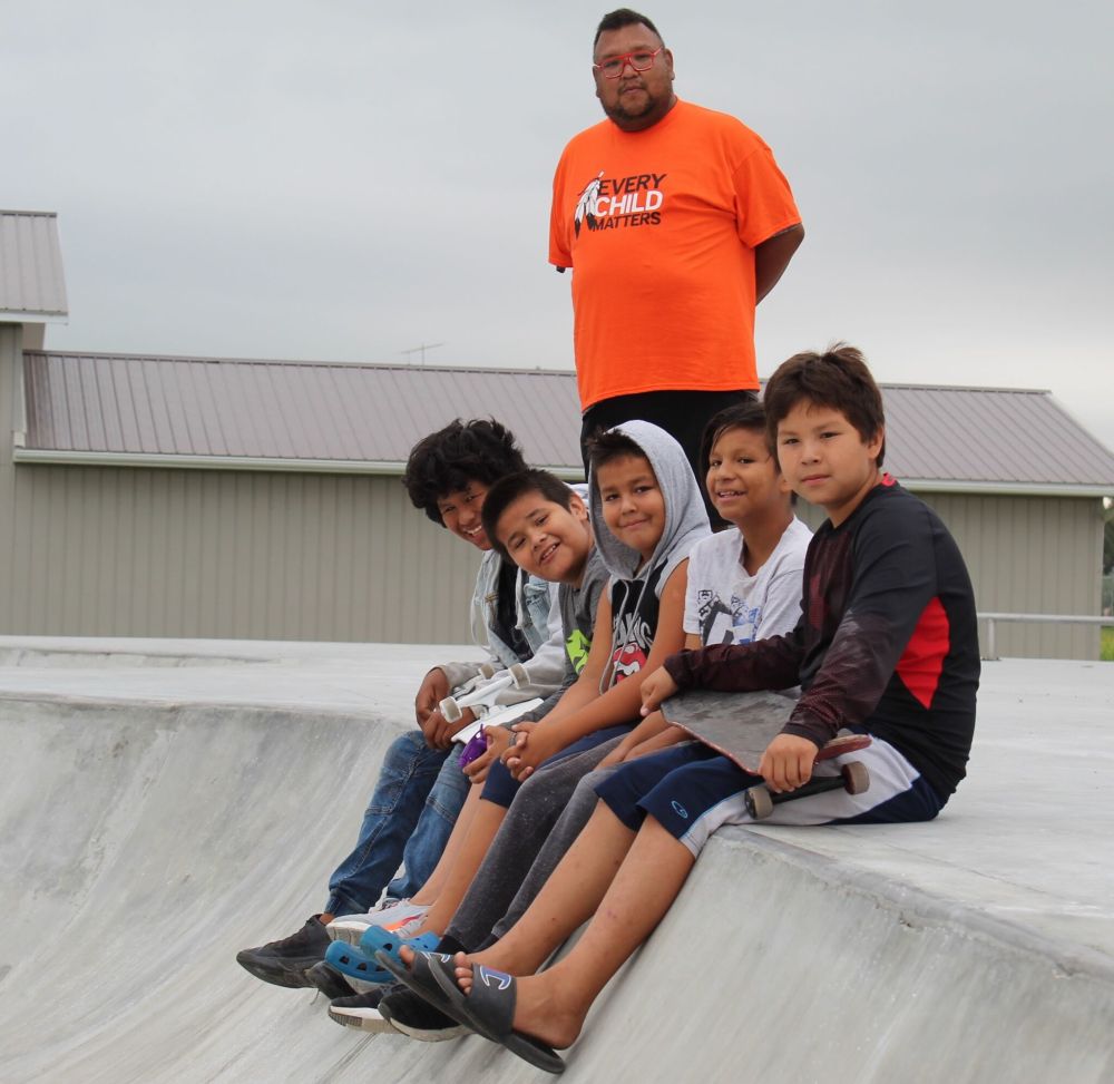 JORDAN ROSS | THE CARILLON
Recreation director Jason Henry checks out the new skatepark with a group of local skateboarders.