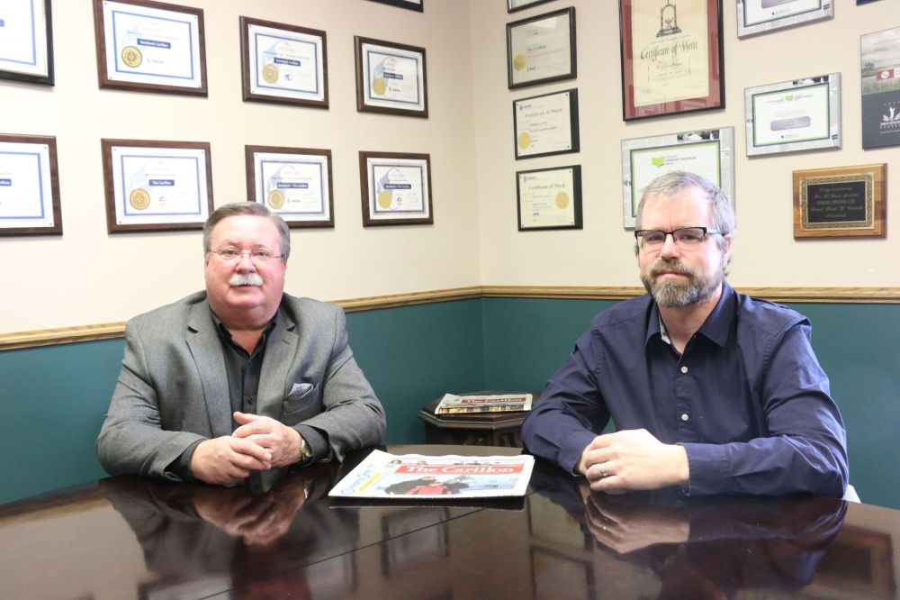 Terry Frey The Carillon
The Carillon publisher Laurie Finley and editor Greg Vandermeulen face the challenge of finding wall space to display the latest awards in the board room at 377 Main Street.