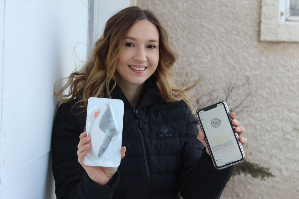 JORDAN ROSS | THE CARILLON
Brooklyn Gigolyk, a university student with Type 1 diabetes who lives near Kleefeld, displays the $100 sensor for her continuous glucose monitor, which provides real-time data via a smartphone app.