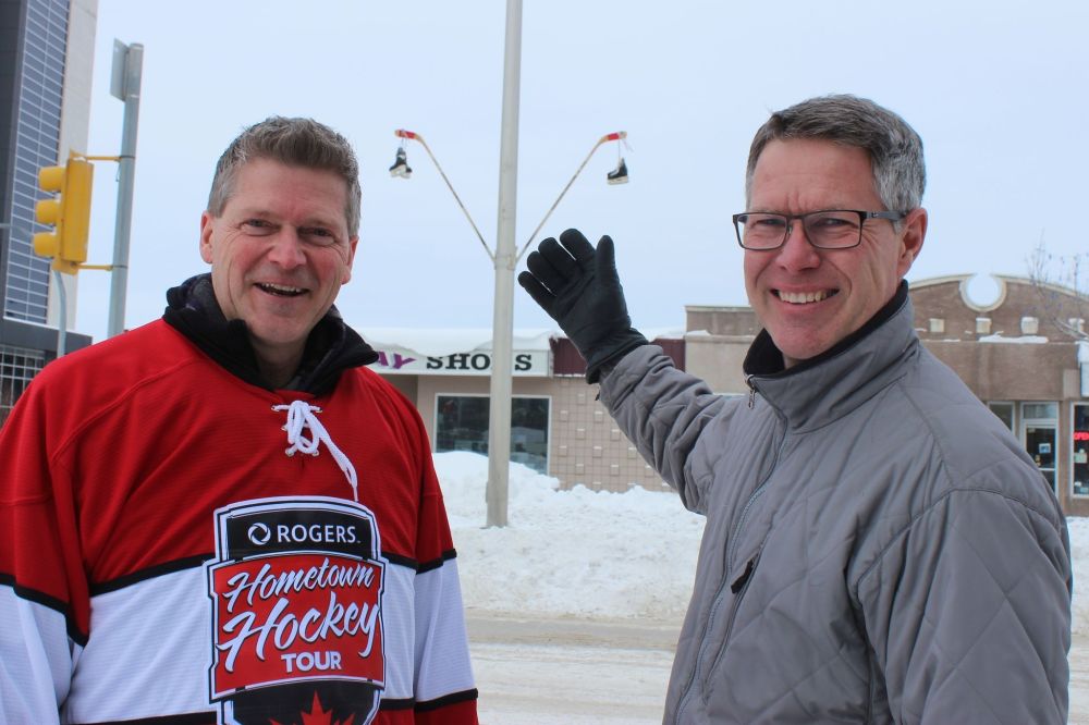 GRANT BURR | THE CARILLON
Steinbach city manager Troy Warkentin and Parks and Recreation Department Head Russ Dyck show off the display of skates and sticks that have been added along the city's main street.
