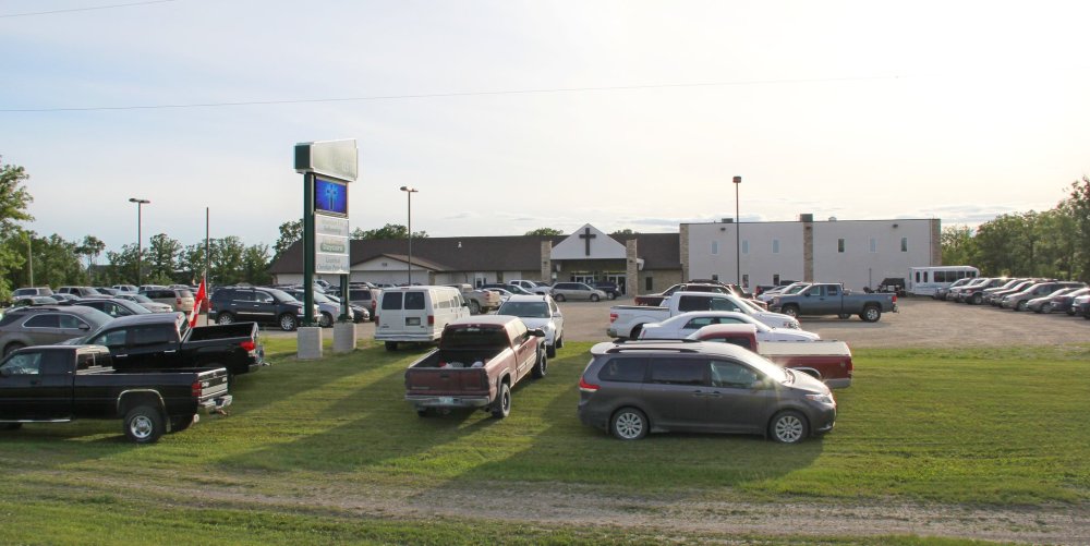 IAN FROESE | THE CARILLON
It was a packed parking lot outside Abundant Life Fellowship as the community gathered to remember Dave Neufeld Thursday night, who passed away earlier that day in an ultralight plane crash.