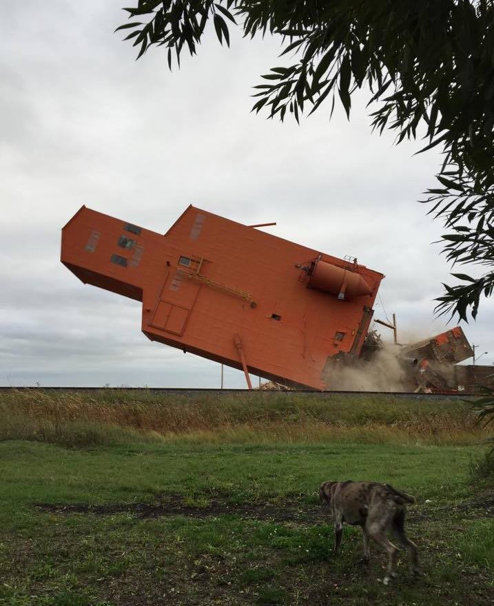 PHOTO BY MATT RAFFARD
The Carey grain elevator comes crashing down Wednesday morning.