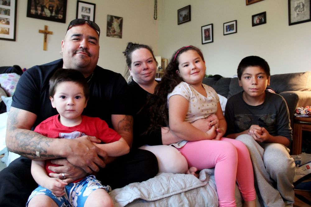 IAN FROESE | THE CARILLON
William and Becky Pangman with three of their children, from left, William II, Wisdom and Ashton, at their Third Street home in Steinbach, only a block and a half away from where their home burnt down last November. The family wants to thank the hundreds who came to their rescue after they lost the roof over their head and many possessions.