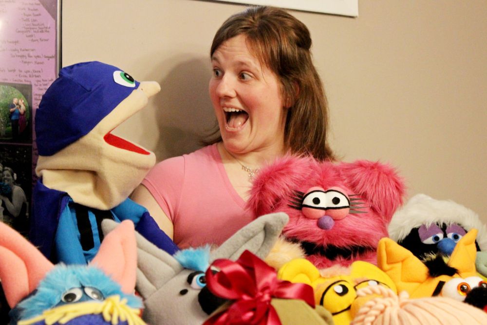 ADRIANA MINGO | THE CARILLON
Kara Nordstrom poses with puppets she has made, including Masked Avenger.