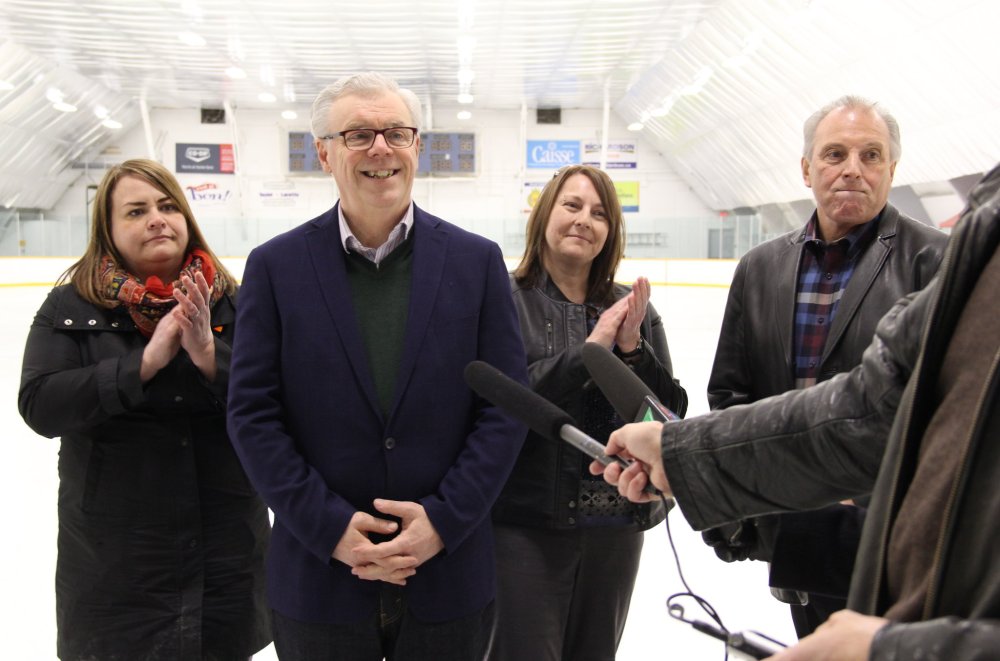 IAN FROESE | THE CARILLON
NDP candidate Roxane Dupuis, party leader Greg Selinger, president of the Lorette Community Complex board Colleen Jolicoeur and retiring MLA for the riding Ron Lemieux gather at the party's announcement Monday afternoon at the Lorette arena.