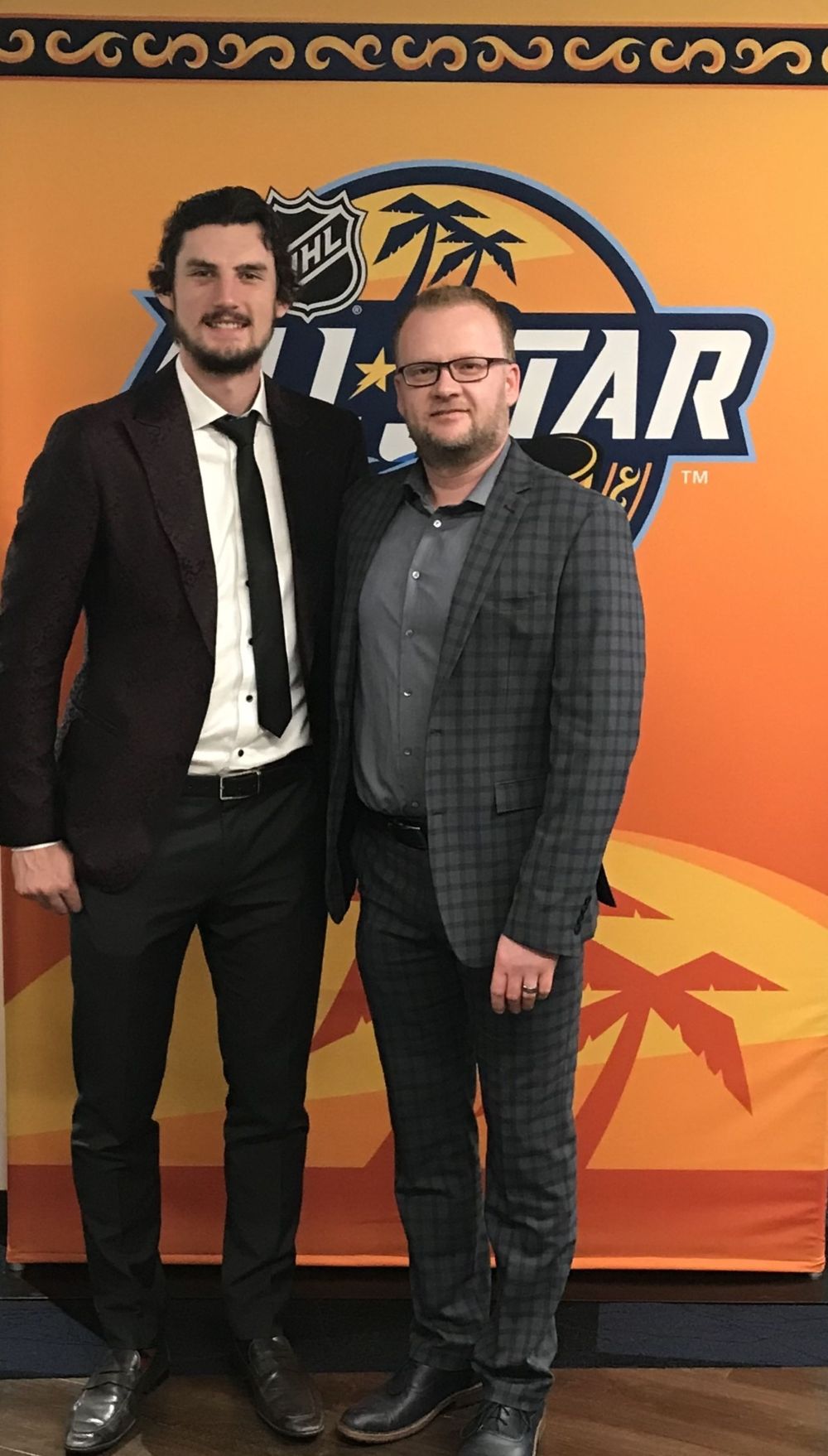 Submitted photo
Player agent Ray Petkau with Jets' goaltender Connor Hellebuyck at the NHL all-star game in Tampa in January.
