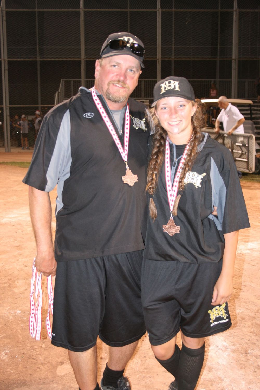 Submitted photo
Jeremy Culleton and his daughter Caitlin Culleton with the bronze medals they won for Team Manitoba at the 2017 Canadian National 16U Girls Baseball Championships.