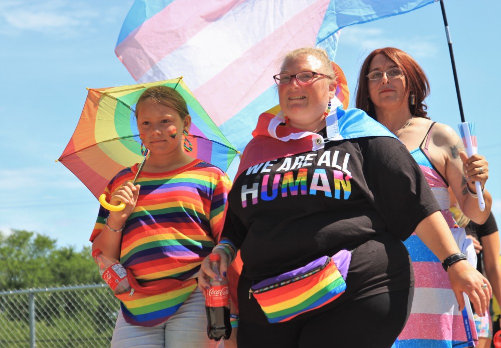 NICOLE BUFFIE | THE CARILLON
Participants take part in the fifth annual Steinbach Pride march on Sunday afternoon.
