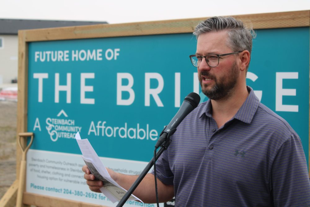 GREG VANDERMEULEN THE CARILLON
Steinbach Community Outreach board chair Elroy Peters speaks the sod turning for The Bridge.