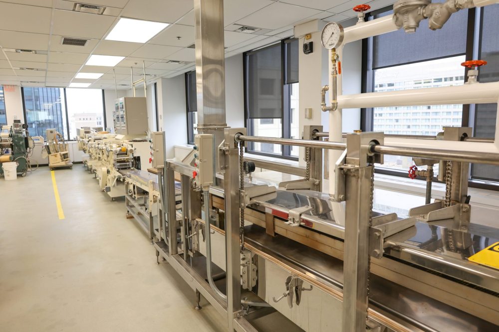 LEE HUSCROFT CEREALS CANADA
Stretching the length of the building on the 11th floor, Japanese noodle making equipment is a pilot-sized production line for making Ramen noodles.