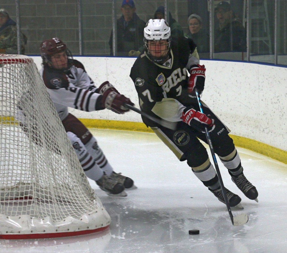 Slade Sotheran was whistled for slashing on this play. (Cassidy Dankochik The Carillon)