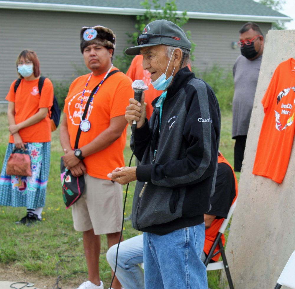 JORDAN ROSS CARILLON ARCHIVES
Charlie Nelson speaks at an Honour Walk ceremony in Roseau River First Nation on July 28, 2021 as Chief Craig Alexander looks on.