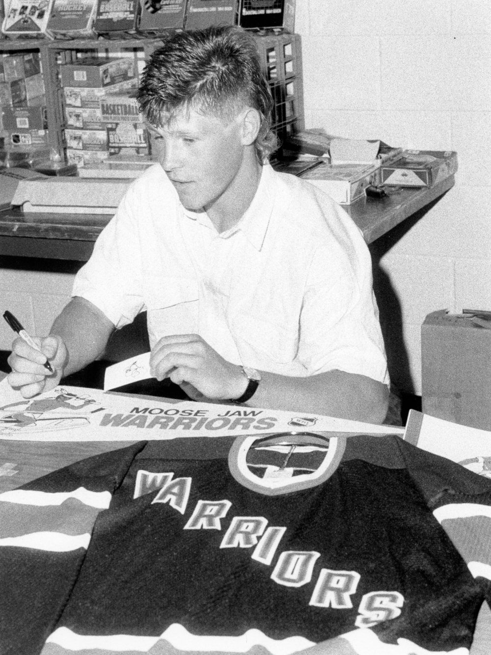 Western Hockey League all-star defenceman Paul Dyck, who is about to be inducted into the Moose Jaw Warriors hall of fame, was kept busy signing autographs at Steinbach’s sports cards show in May of 1991. (Carillon Archives)
