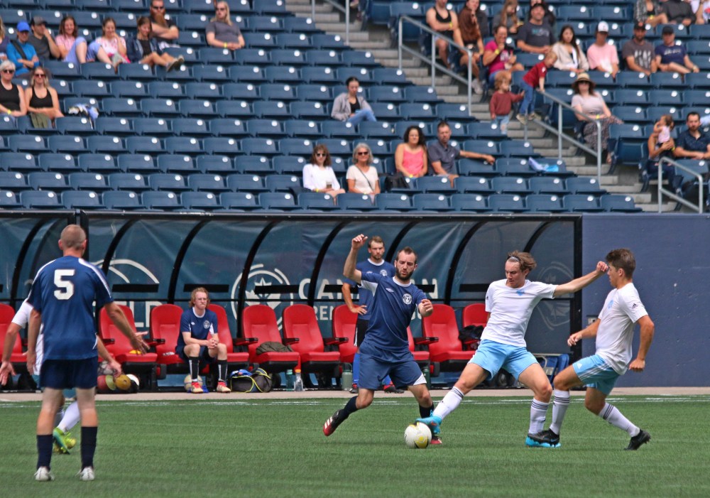 A Niverville Force and Hanover Sting player battle for the ball at a game inside IG Field. The two second division eastman teams battled it out before a Valour FC Canadian Premier League game in July. (Cassidy Dankochik The Carillon)