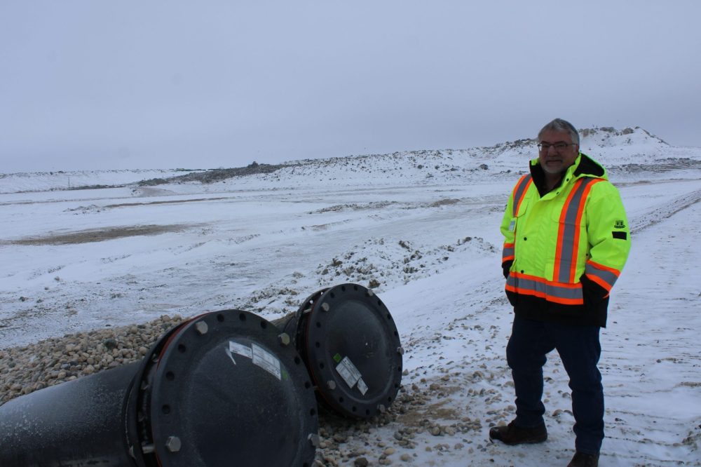 GREG VANDERMEULEN THE CARILLON
Eldon Wallman, City of Steinbach manager of solid waste, stands beside pipes used to pump out leachate in the new cell.