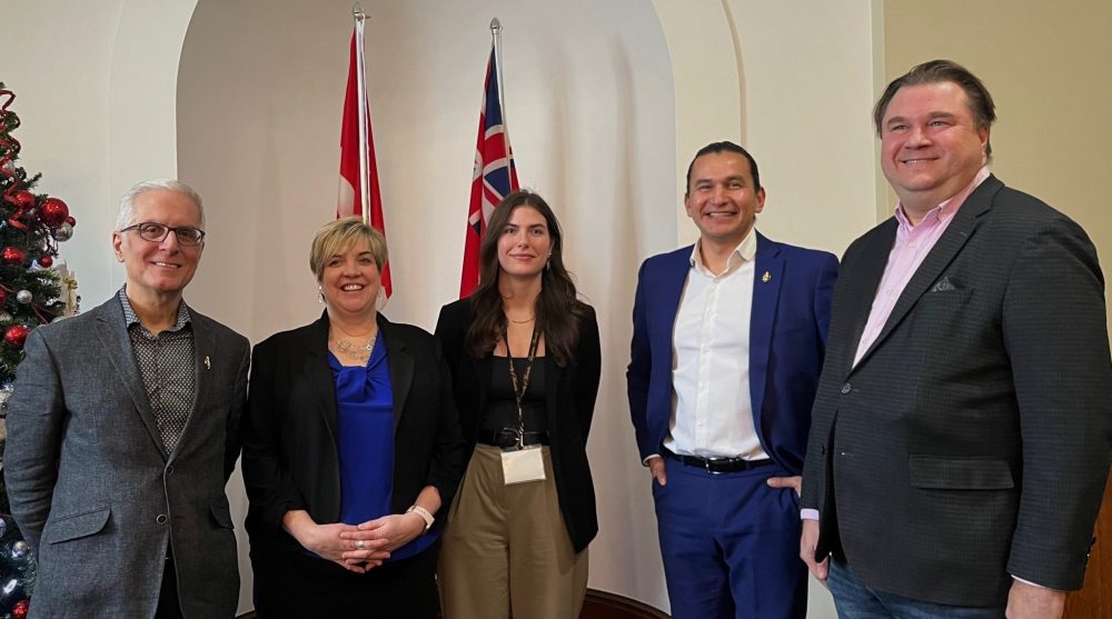 SUPPLIED
NDP MLAs Nello Altomare, Lisa Naylor, Wab Kinew, and Mark Wasyliw pose with Trinity Sperling during Youth Parliament of Manitoba.