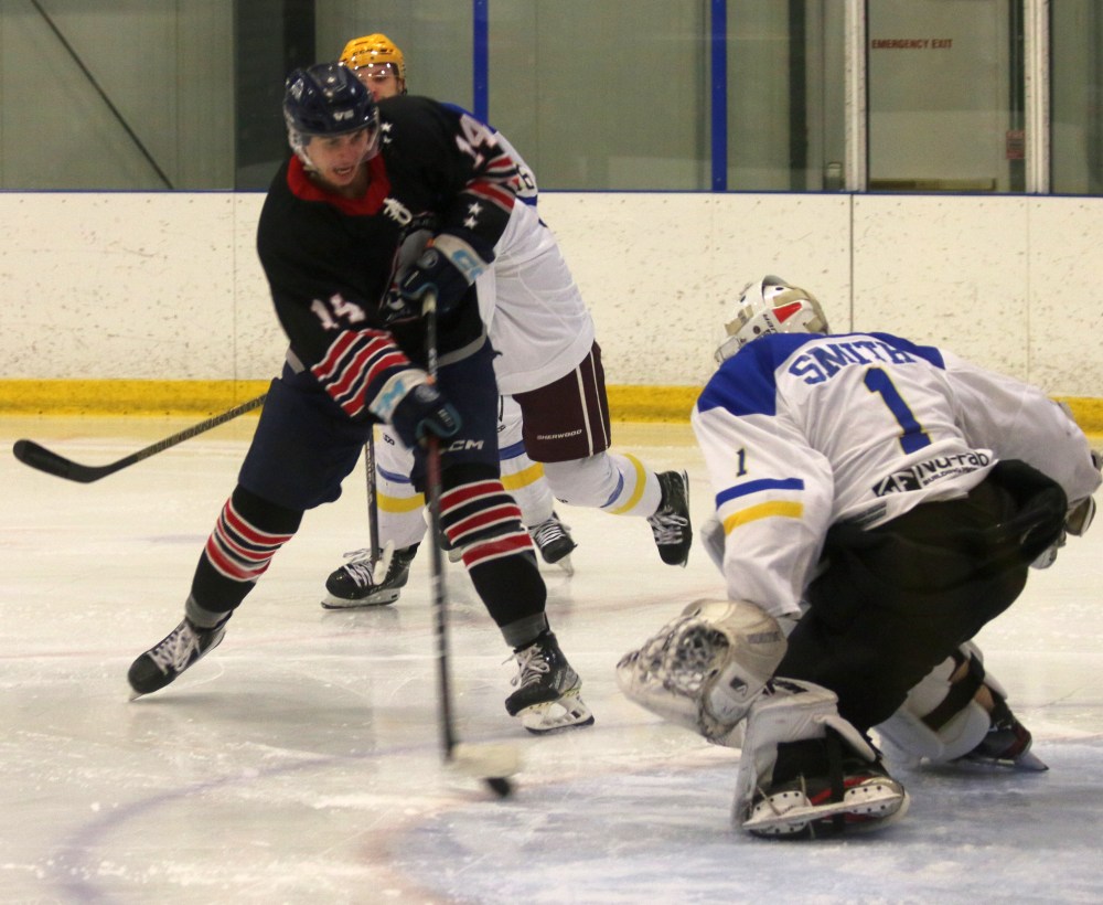 Dawson Milliken is denied by La Ronge Ice Wolves goalie Dawson Smith during a game at the MJHL/SJHL showcase. (Cassidy Dankochik The Carillon)