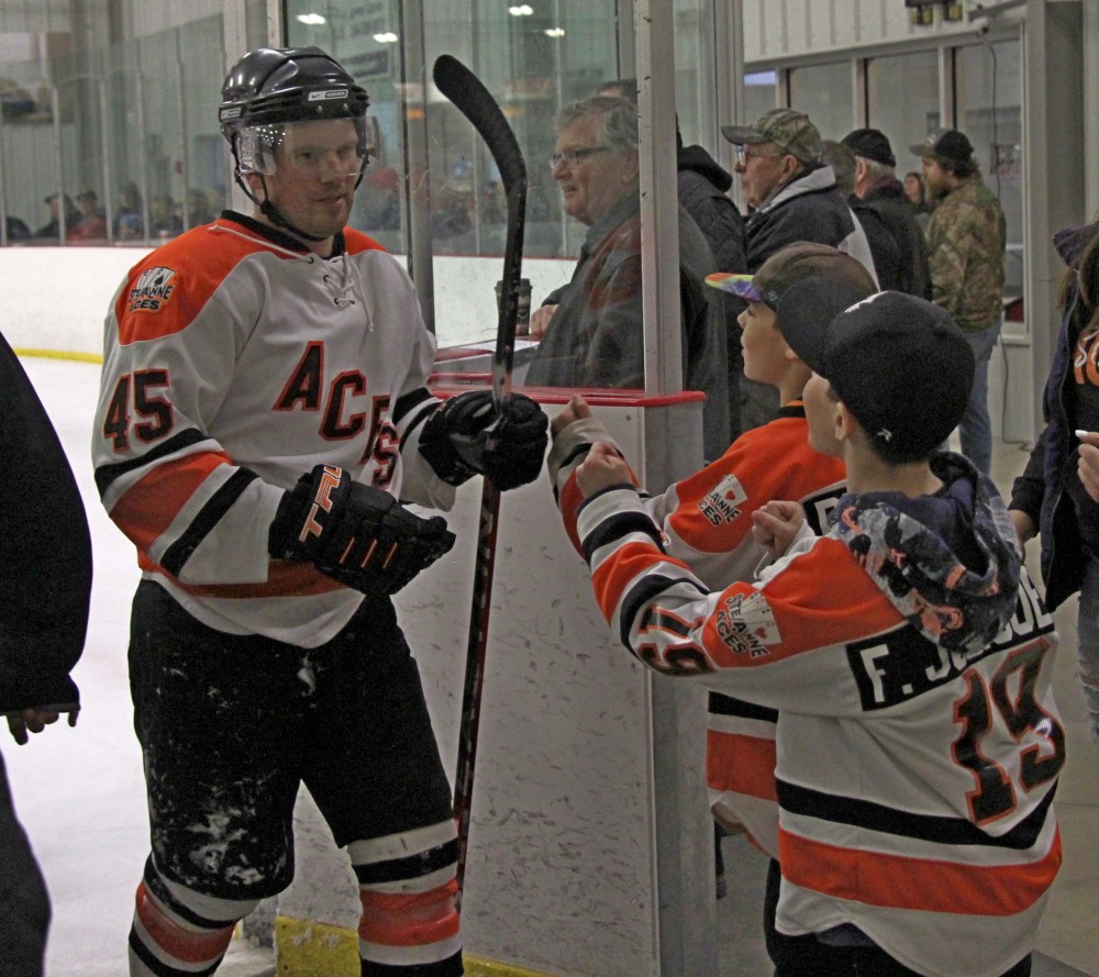 Joey Moggach gets fist bumps from Aces fans inside the East End Community Centre after the second period. Ste Anne mounted a comeback attempt, drawing the game to 5-3 after falling behind 5-0, but couldn't complete it in the third period. (Cassidy Dankochik The Carillon)