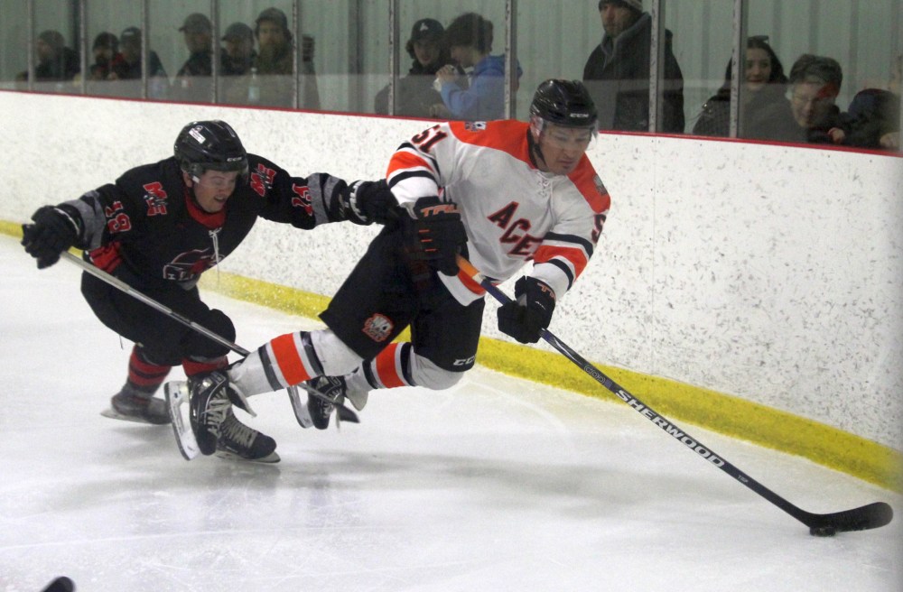 Harley Garrioch is tripped up as he looks to cycle the puck during the provincial senior final against Miniota/Elkhorn. Garrioch wasn't alone in falling flat for the Aces in game three, as the team fell behind 5-0 in the first period en route to losing the banner after winning game one. (Cassidy Dankochik The Carillon)