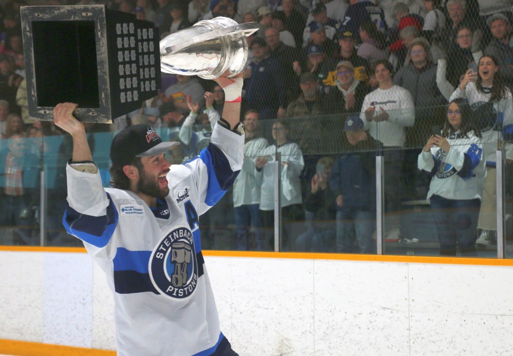 Landon Roberts celebrates with the Turnbull Cup after winning it with the Steinbach Pistons. The Souris, Man. born forward will be headed east, as he committed to Carleton University to continue his hockey playing career in the nations capital. (Cassidy Dankochik The Carillon)