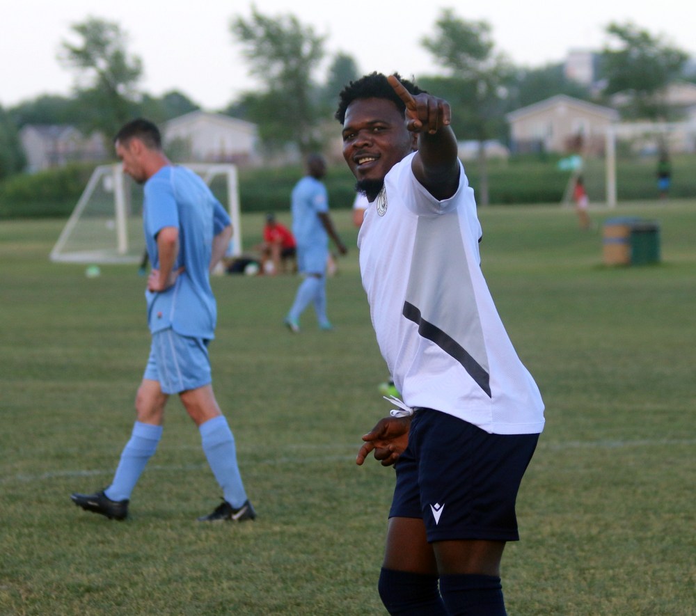 Ngongo Bushiri flashes a smile after opening the scoring during a MMSL first division game. (Cassidy Dankochik The Carillon)
