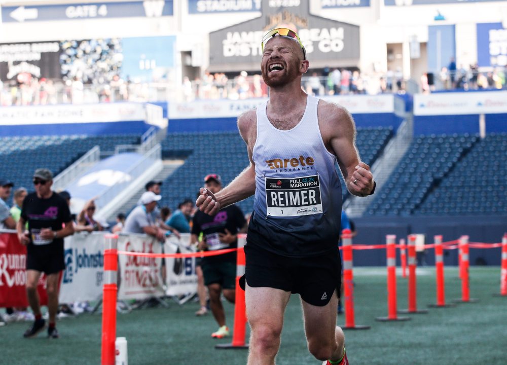 JOHN WOODS / WINNIPEG FREE PRESS
Steffan Reimer, celebrates his second place finish in the 45th Manitoba Marathon in Winnipeg, Sunday, June 18, 2023.