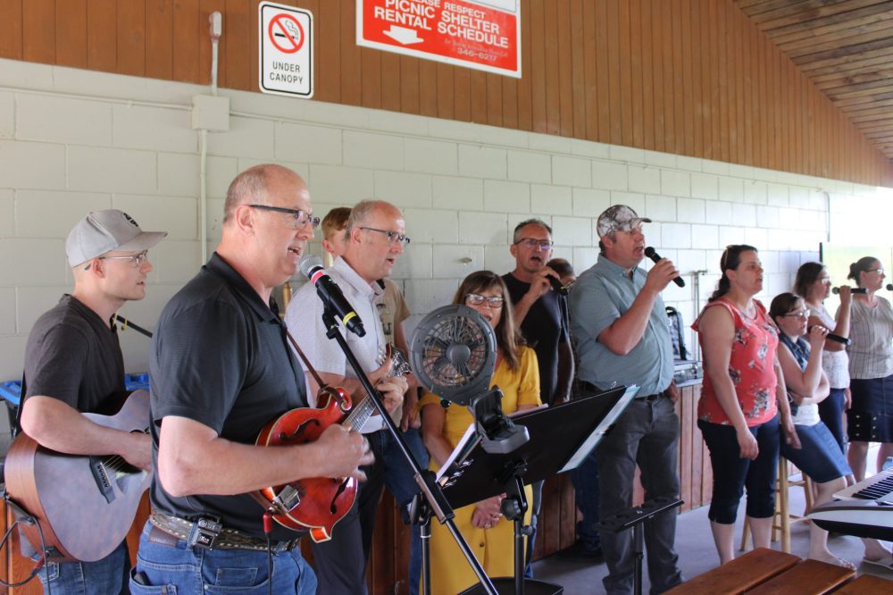 GREG VANDERMEULEN THE CARILLON
Singers entertain attendees of the Steps by Faith fundraiser in A.D. Penner Park on May 27.