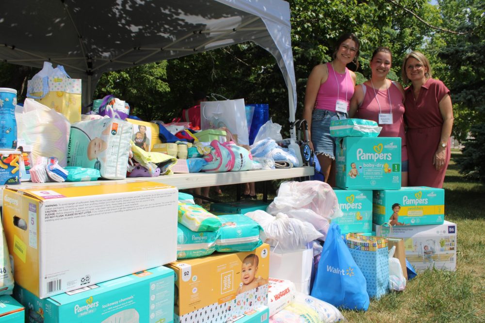 GREG VANDERMEULEN THE CARILLON
Volunteers Rhea Peters and Annabelle Kehler stand with Life Culture Executive Director Susan Penner and the massive pile of donations brought to the Walk for Life.