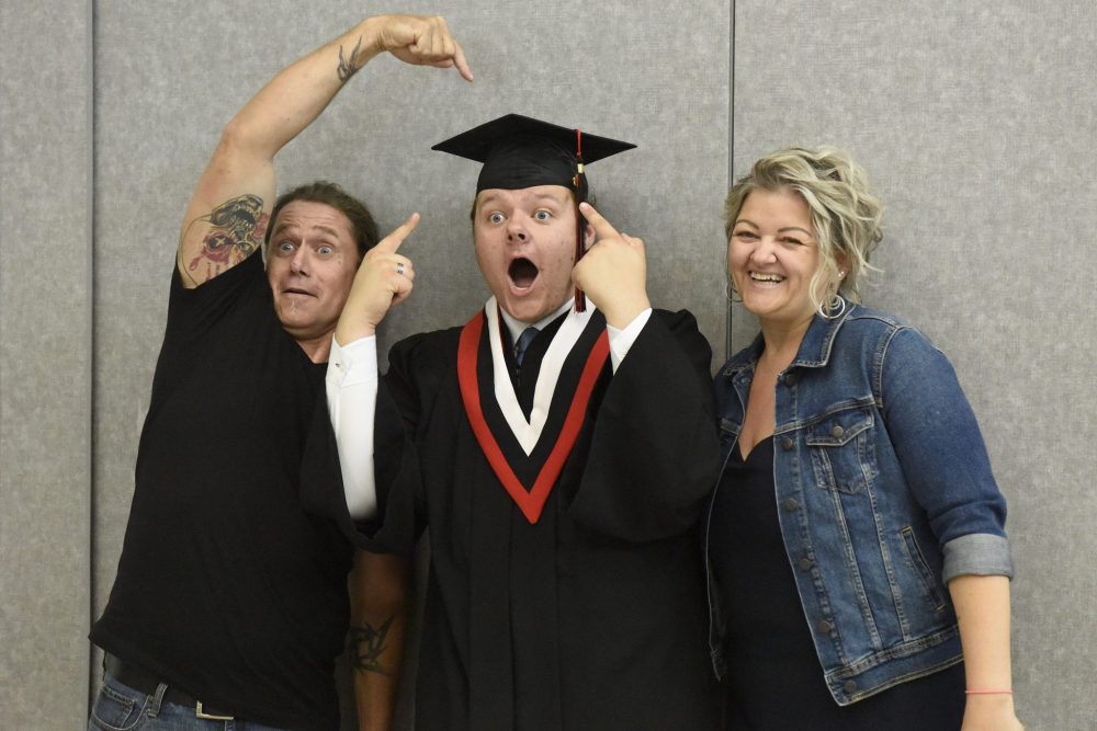 SVJETLANA MLINAREVIC The Carillon
Niverville High School graduate Ryder Lewis (centre) laughs it up with Wayne Kehler and his mom Sabrina Lewis after his high school graduation ceremony June 28, 2023.