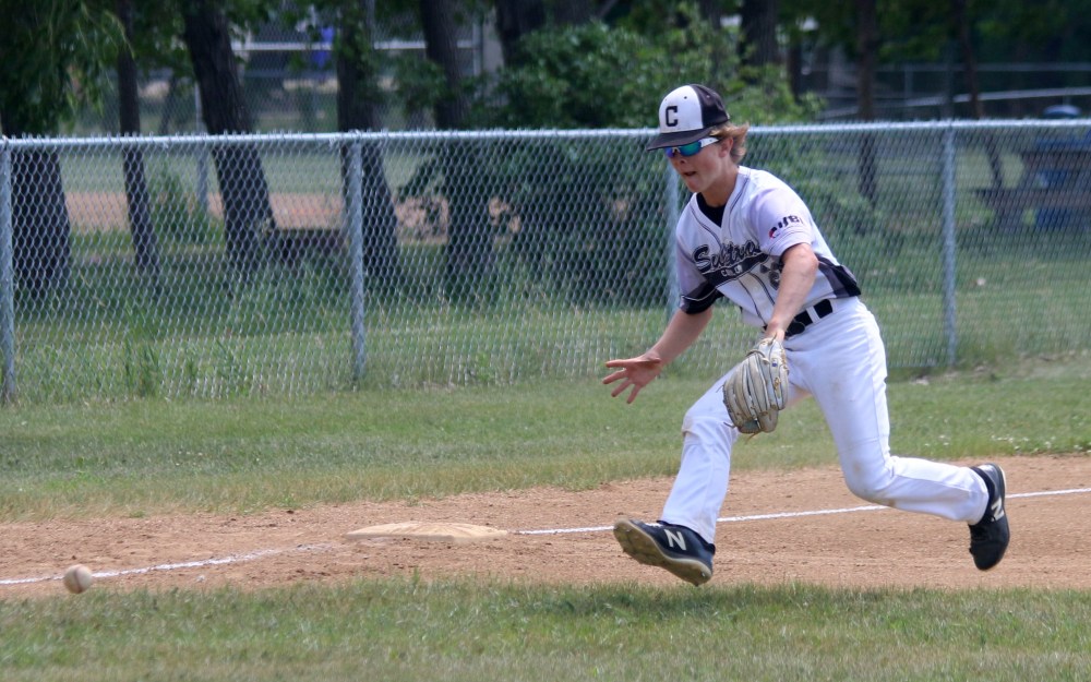 Graeme Pickering attempts a barehand play at third base. (Cassidy Dankochik The Carillon)