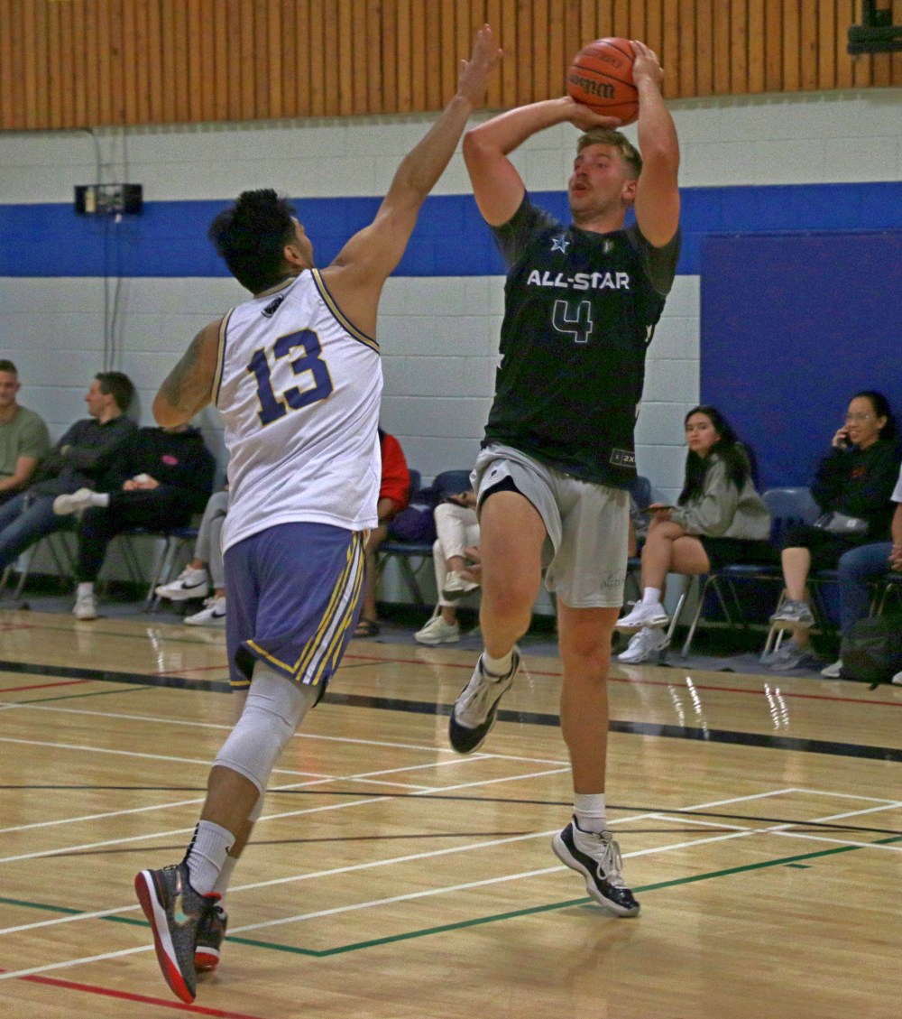 A player looks for a fadeaway jumper during the semi-finals. (Cassidy Dankochik The Carillon)