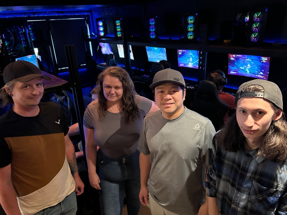 CHRIS GAREAU The Carillon
Ground Zero part owner Jared Reimer, Tia Reimer, owner Lok Mak, and staff member Devon Wynn in front of the bank of computers gamers are using to game and forge friendships face-to-face.