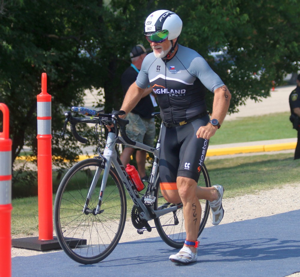 Triathlon athletes must complete their own transition between swimming, biking and running. (Cassidy Dankochik The Carillon)